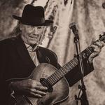 Bill Booth Solo performamce on guitar fiddle and vocals